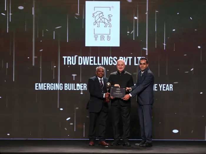 TRU Dwellings receiving the Emerging Builder – Young Achiever of the Year award at the Times Business Awards 2024